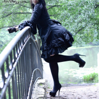 Goth chick Ann Darcy flashing her nice butt outdoors