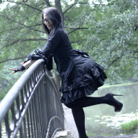 Goth chick Ann Darcy flashing her nice butt outdoors