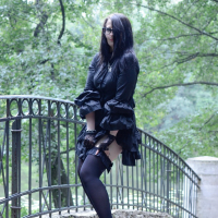 Goth chick Ann Darcy flashing her nice butt outdoors