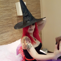 Redhead Babe Ann Darcy exposes her wet Pussy