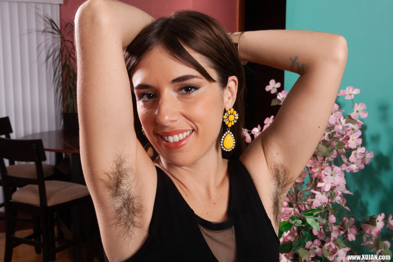 Simone is modeling hew black dress and heels while showing off her hairy pits too She bends over and reveals her hairy pussy as well She spreads her legs shows her hairy bush and is a natural beauty - Photo #2149907
