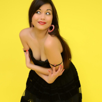 Petra So teasing in her black Dress and Stockings