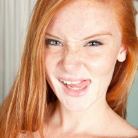 Sexy redhead teen babe Alex Tanner stripping totally naked
