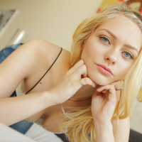 Busty young hottie Alli Rae has a beautiful face and shaved pussy