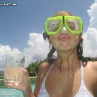 Kari Sweets in Puerto Rico enjoing some beer in a bikini
