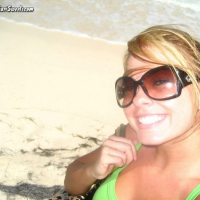 Kari Sweets in Puerto Rico enjoing some beer in a bikini
