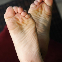 Big tit Kagney showing her amazing feet and cute wet pussy