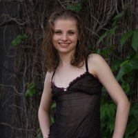 Lil Candy poses in her black teddy nightgown