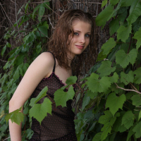 Lil Candy poses in her black teddy nightgown