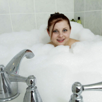 Lil Candy shows off her georgeous teen body while playing in a warm bath of bub