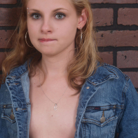 Lil Candy strips out of her denim jacket while showing her cute ass