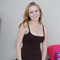 Blonde girl Mae Lynn strips for you in the bedroom