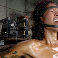 Lotus Lain is strap bound in training for hardcore blowjob