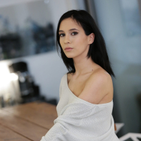 Cute Nikki Fox in thigh high socks flashing a boob