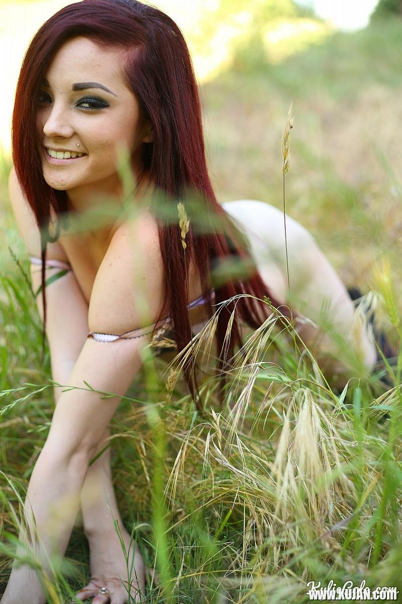 Redhead teen Kylie Cole strips and teases in the field - Photo #2247623