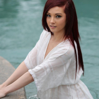 Hot redhead teen Kylie Cole strips for you by the pool