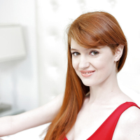 Young redhead amateur Abbey Rain displays her delicious pale body