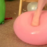 Busty Sabina popping the balloons with her ass feet and nails