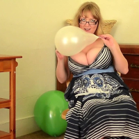 Busty Sabina popping the balloons with her ass feet and nails