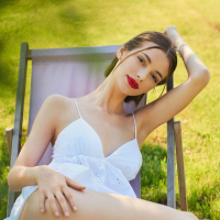 Stunning angelfaced babe Any Moloko teasing naked in the grass field
