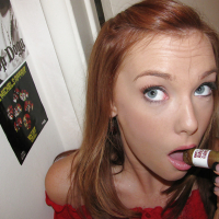 Redheaded amateur Dani Jensen demonstrating her stunning body