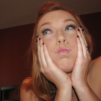 Redheaded amateur Dani Jensen demonstrating her stunning body