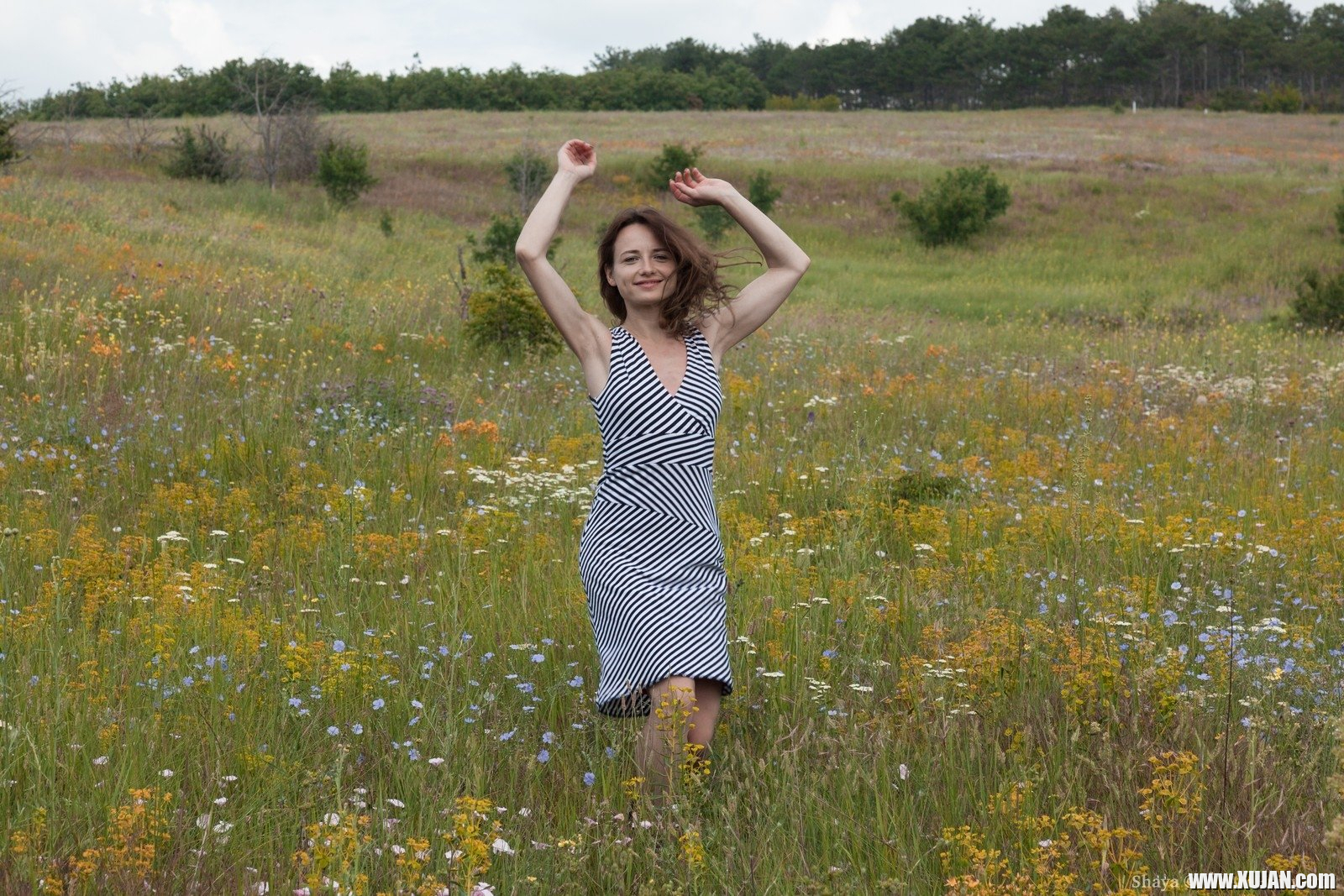 Shaya is enjoying herself in the fields and has a sexy grey dress on She takes off her dress and panties off and relaxes on her red towel She masturbates and fingers her hairy pussy and has fun - Photo #2331491