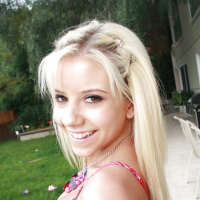 Tiny blonde teen Tessa Taylor revealing nice tits and tit ass on lawn