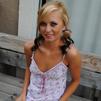 Petite blonde Codie Sweets shows off her round ass