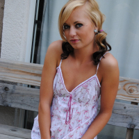 Petite blonde Codie Sweets shows off her round ass