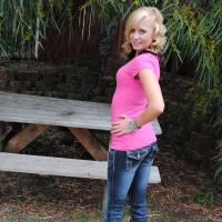 Teasing blonde Codie Sweets pulls down her tight jeans showing off her perfect teenage ass outdoors