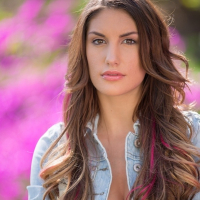 Slutty model August Ames posing showing amazing forms outside