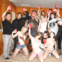 Slutty girls having fun at the drunk party with lascivious guys