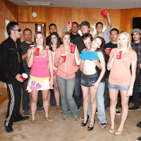 Slutty girls having fun at the drunk party with lascivious guys