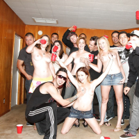 Slutty girls having fun at the drunk party with lascivious guys