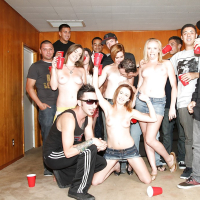 Slutty girls having fun at the drunk party with lascivious guys