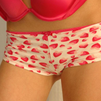 Redhead teen Kori Kitten teases in her cute boyshorts