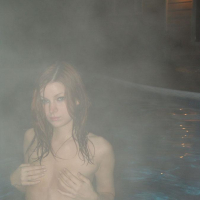 Redhead teen Kori taking a night time swim