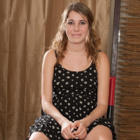 Amateur coed Kinsley Eden gets naked and plays with herself