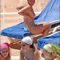 Lisa Scott Lee exposing her nice huge boobs on pool paparazzi shoots