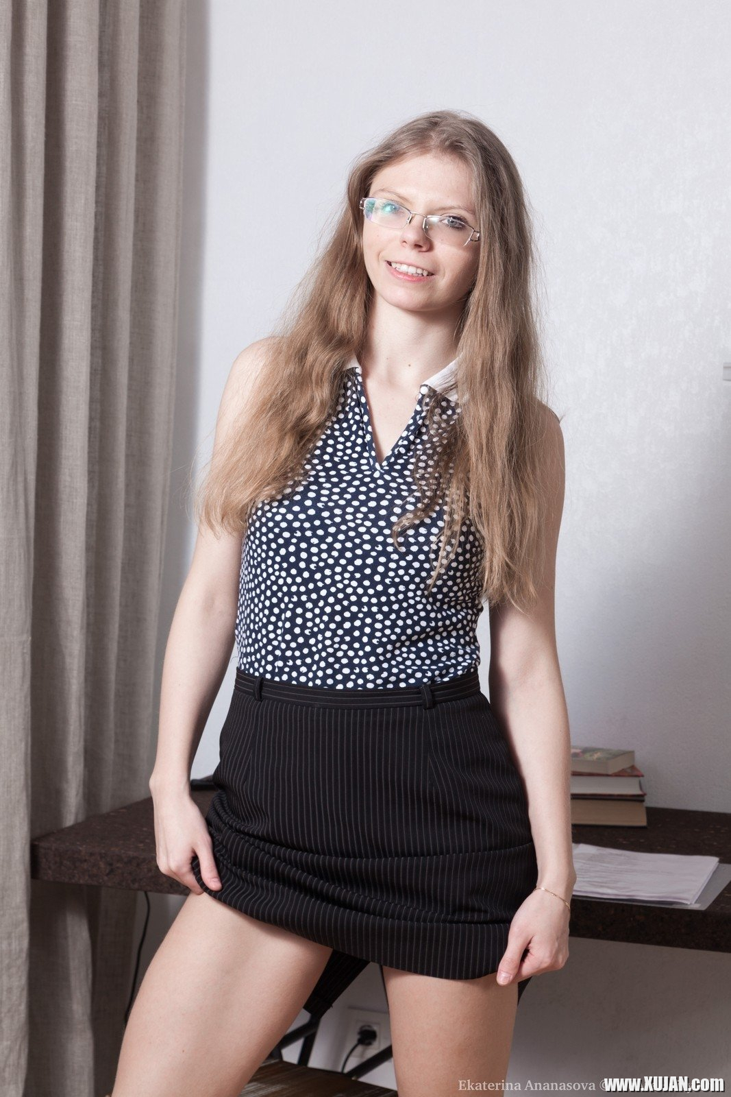 Ekaterina Ananasova sits at her desk reading and showing off her panties up her skirt She strips nude and strokes her hairy pussy a lot She finishes by masturbating and orgasming at her desk - Photo #2450071