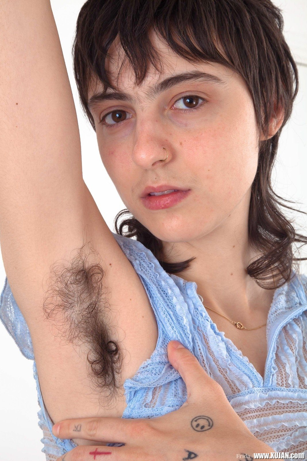 Frida is relaxing on her sofa and showing off her hairy pits She undresses and lays naked on her lonely sofa She has a full hairy pussy that she enjoys touching and shows off her hairy body there - Photo #2466569