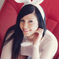 Sexy dark haired bunny Catie Minx flashes her amazing curves