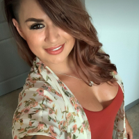 Tattooed Eva Angelina having fun while posing for the camera