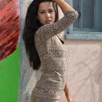 Brunette teen Bella Quinn is dressed for success