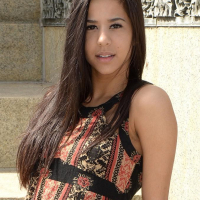 Brunette teen Bella teases in her dress on the steps