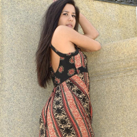 Brunette teen Bella teases in her dress on the steps