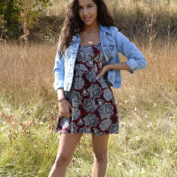 Brunette beauty Bella Quinn poses for you in the field
