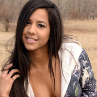 Brunette teen Bella Quinn teases on the bench outside