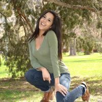 Brunette teen Bella Quinn teases and poses in the tree